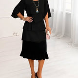 Sophie | Elegant, flowing dress with ruffles