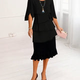 Sophie | Elegant, flowing dress with ruffles